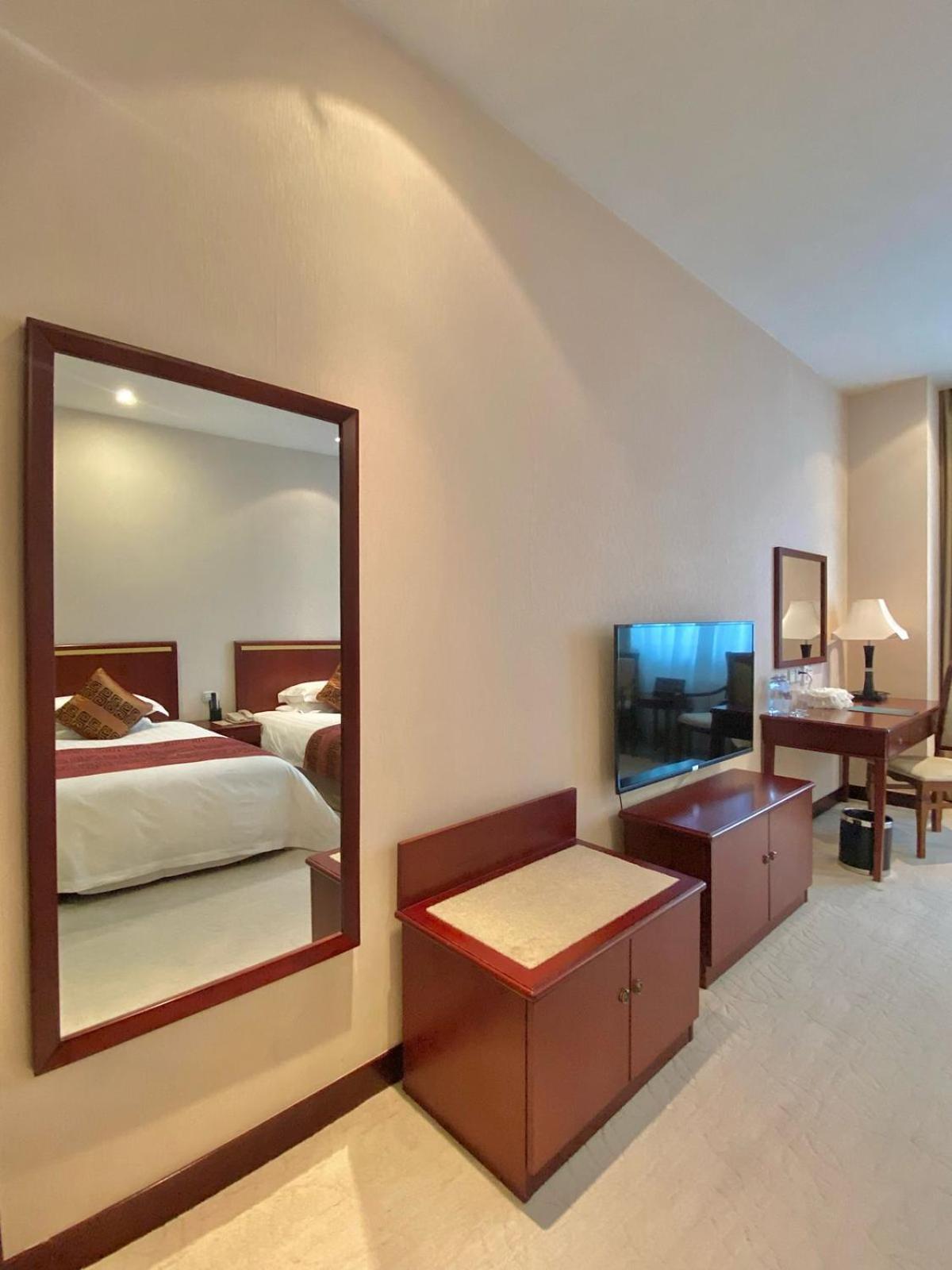 Beijing Palace Soluxe Hotel Astana Exterior foto A room at the hotel